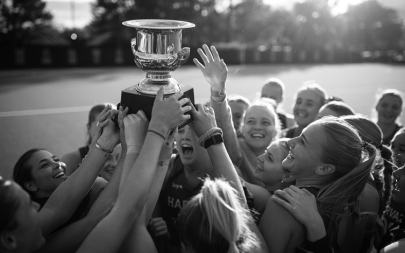 students with a trophy
